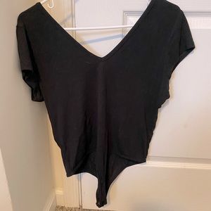 Black thong body suit size large. Worn once